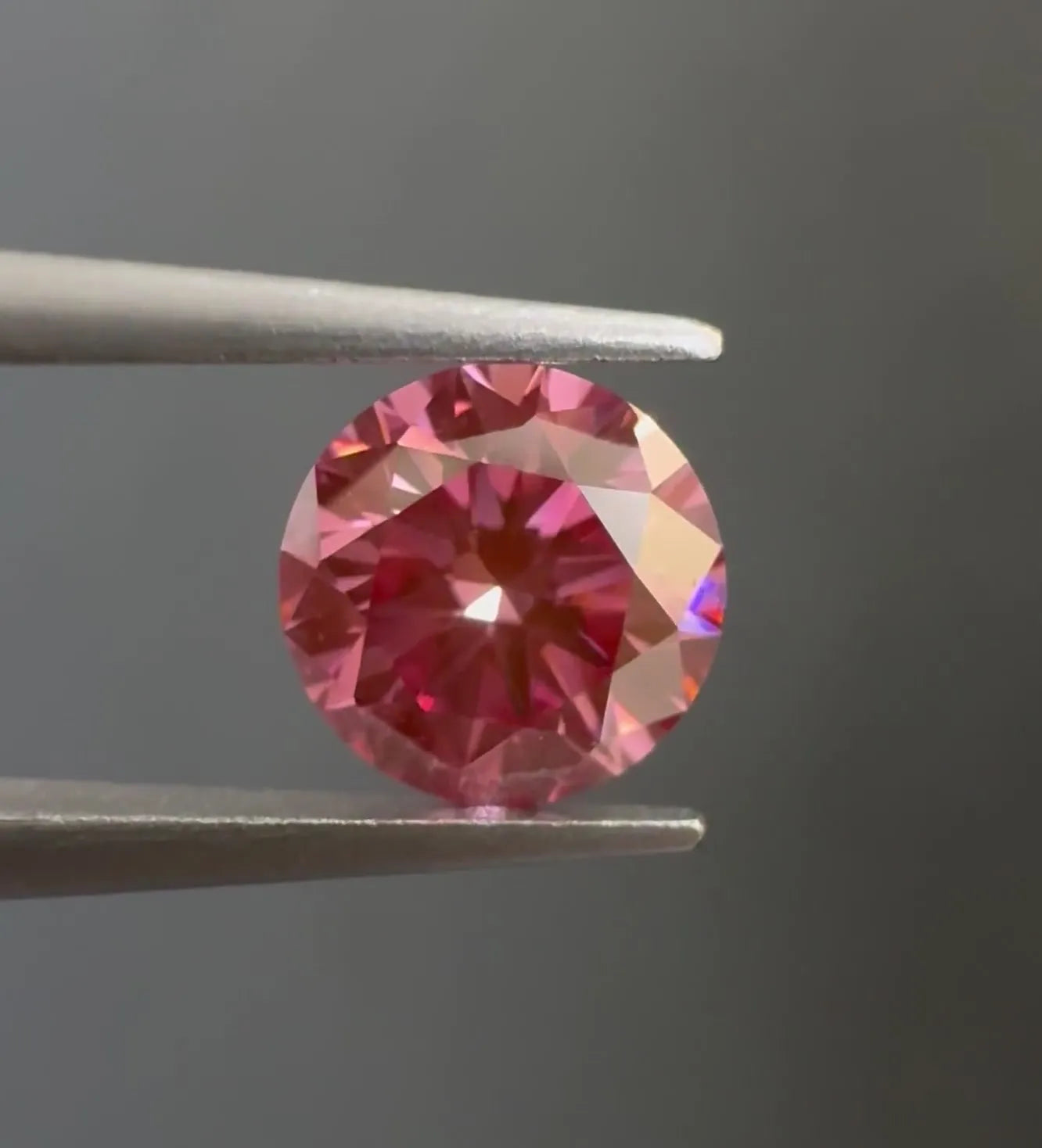 0.76ct Round Natural Diamond (Colour Fancy Intense Pink, Clarity VVS2, Cut VG, IGI Certified)